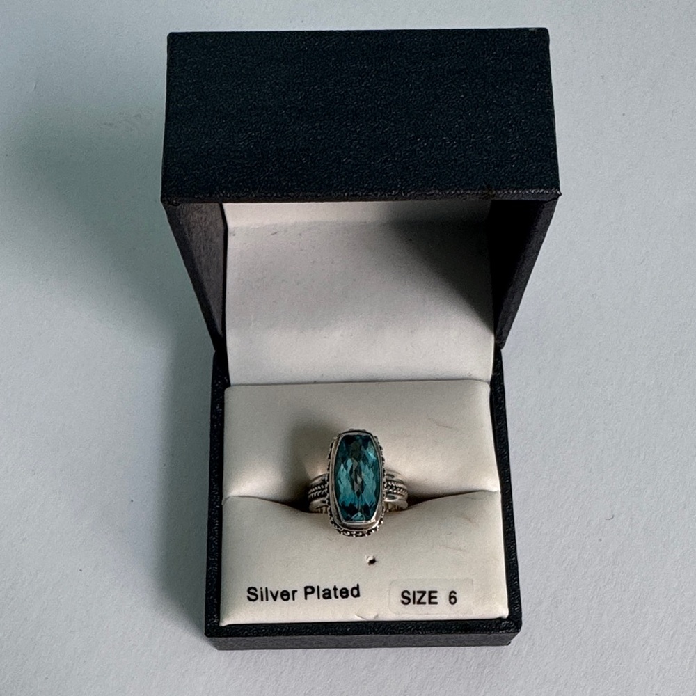 Elegant Blue Topaz and silver ring